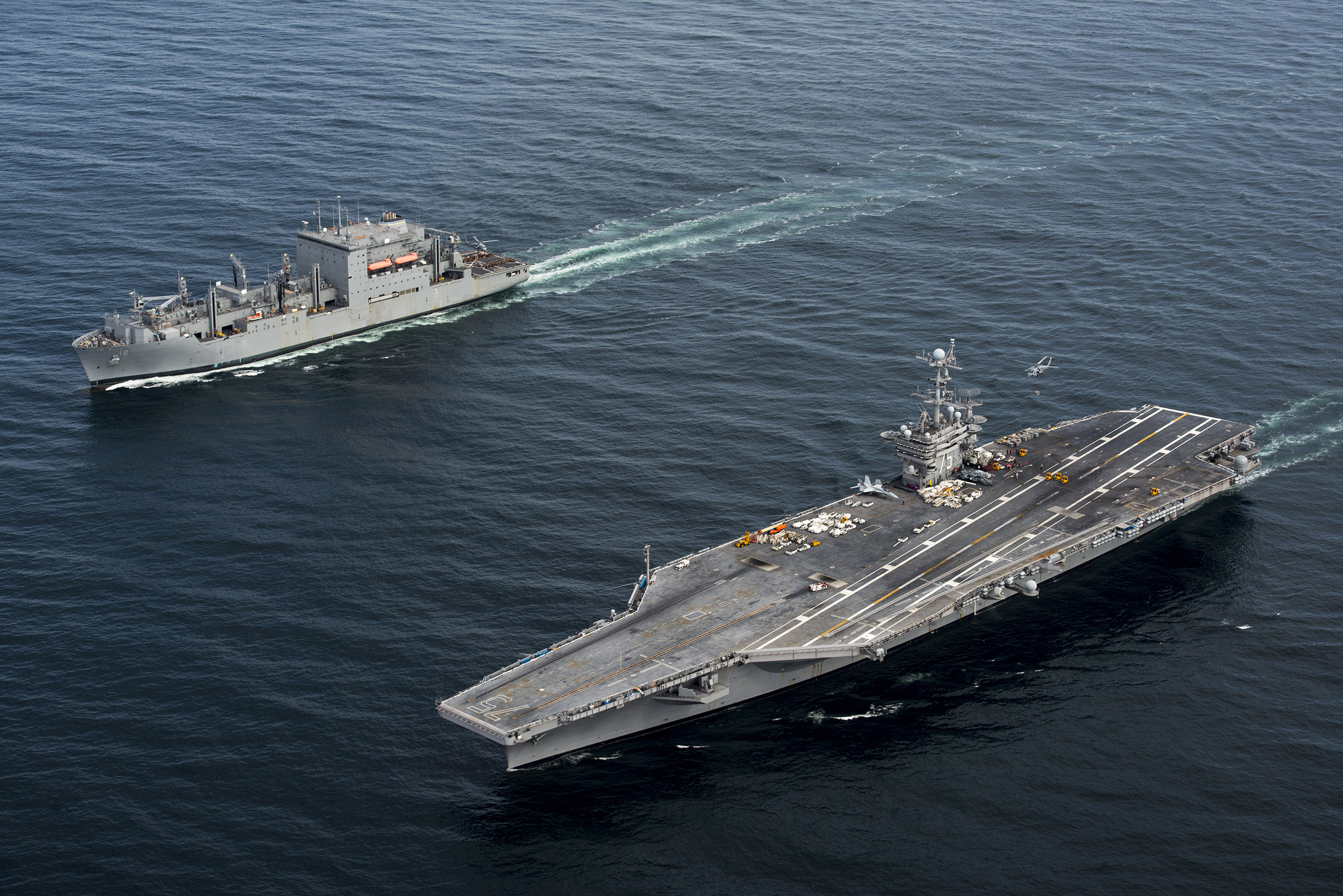 150603-N-NK123-359 
ATLANTIC OCEAN (June 3, 2015) The aircraft carrier USS Harry S. Truman (CVN 75) participates in an ammunition onload with the Military Sealift Command dry cargo and ammunition ship USNS William McLean (T-AKE 12). Harry S. Truman is underway conducting an ordnance-handling evolution. (U.S. Navy photo by Mass Communication Specialist 3rd Class J. S. Richardson/Released)